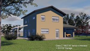 BiHolz Casa Z prefabbricata in legno rivestita in larice e con intonaco più scuro.